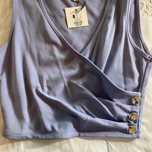 Two piece periwinkle shirt and mid skirt brand new with tags